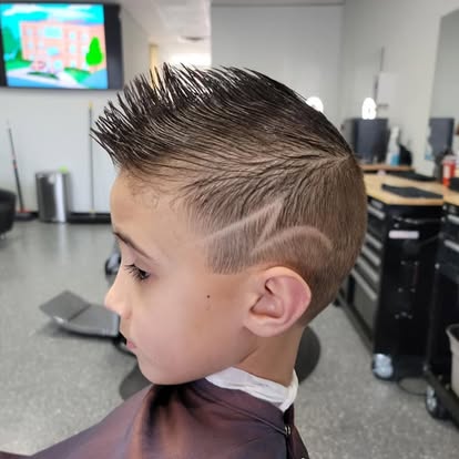 Brushed-up quiff with mid fade, Tomasso's Barber Turnersville