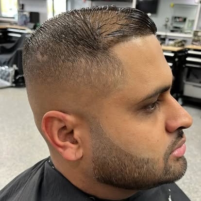 Full beard sculpt and haircut combo at Tomasso's Barber