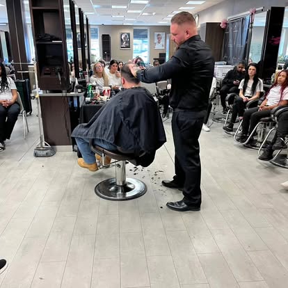 Barber finishing a fresh fade at Tomasso's, Turnersville NJ