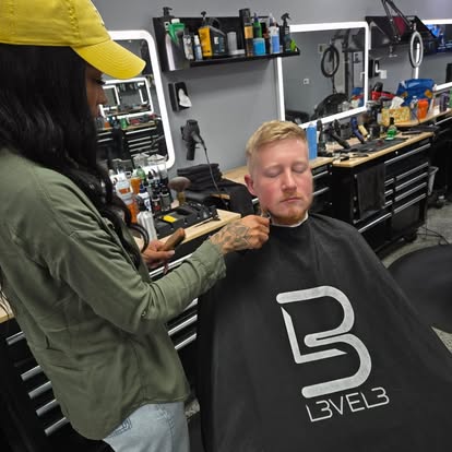 Beard detailing with a straight razor at Tomasso's Barber
